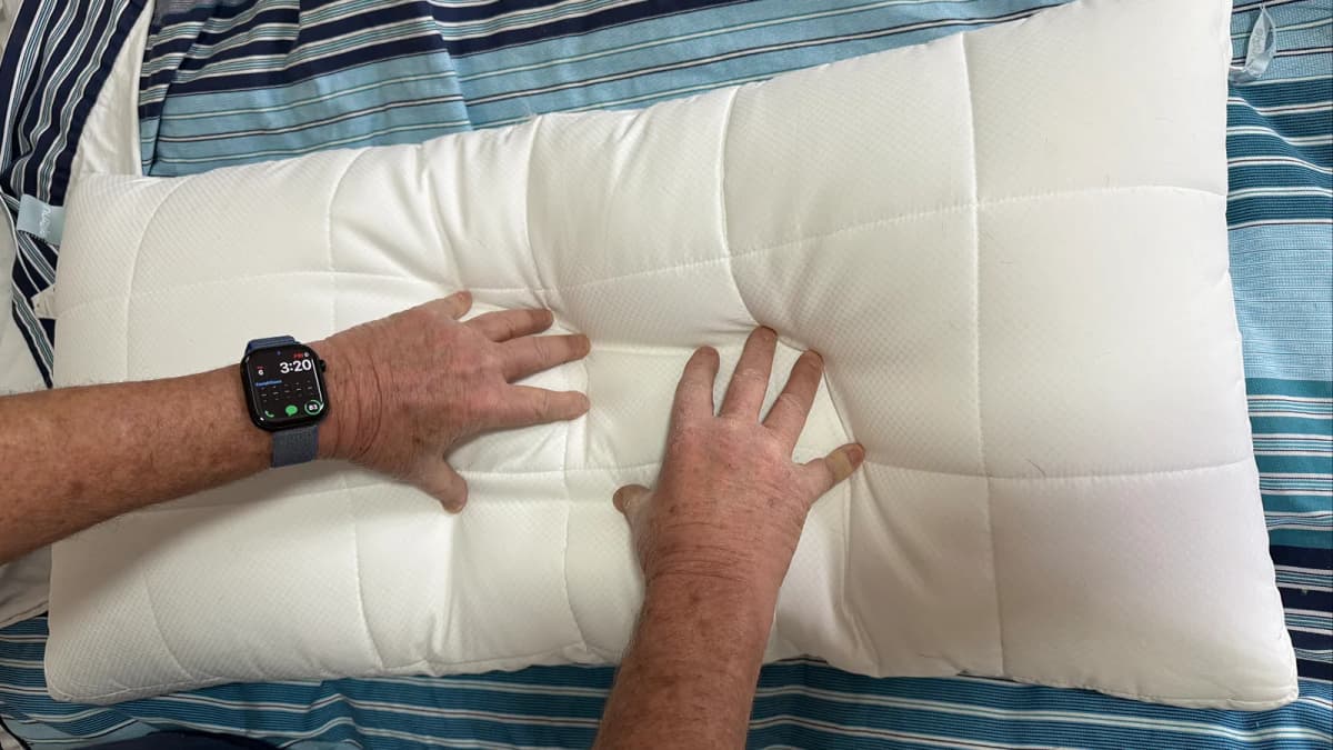 Hand pressing pillow demonstration